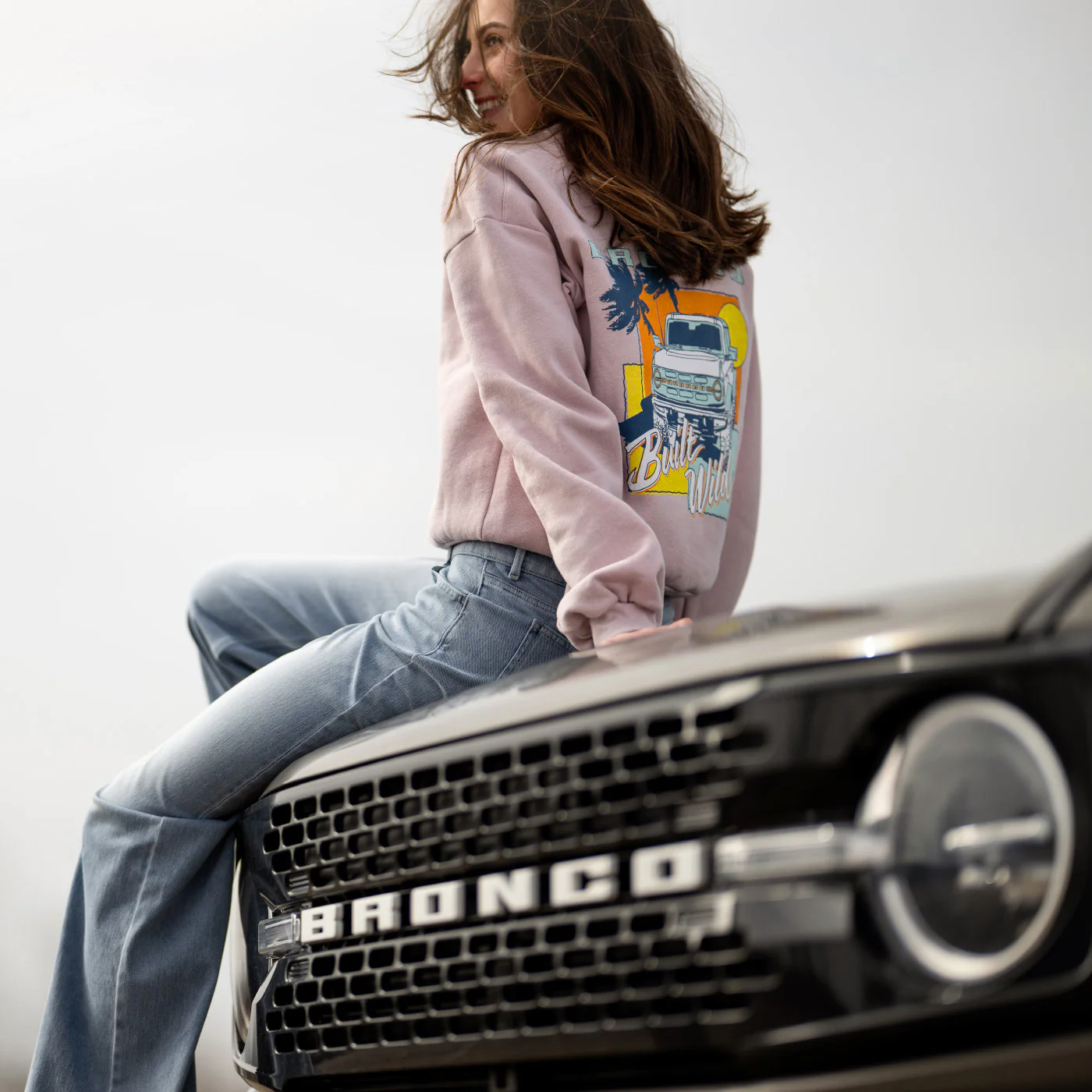 65-ford-bronco-built-wild-womens-light-pink-crewneck-sweatshirt-2.webp Ford Bronco Built Wild Womens Light Pink Crewneck Sweatshirt