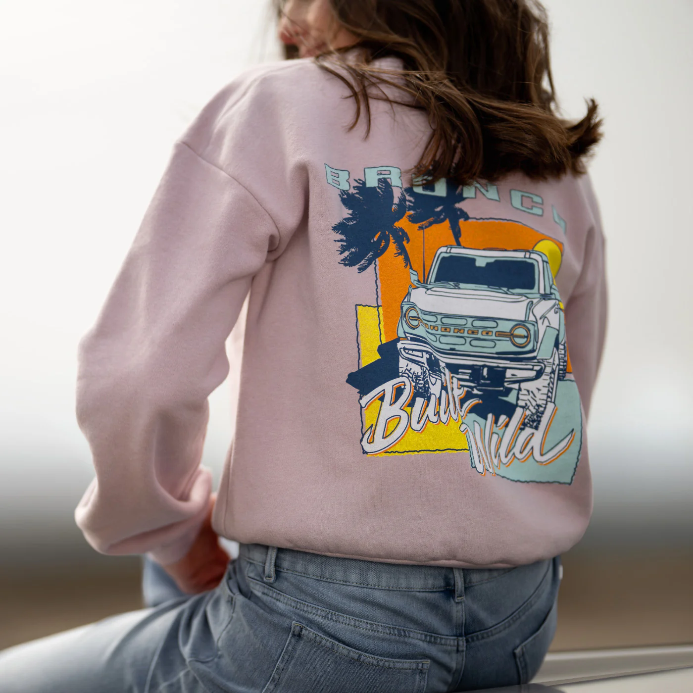 65-ford-bronco-built-wild-womens-light-pink-crewneck-sweatshirt-4.webp Ford Bronco Built Wild Womens Light Pink Crewneck Sweatshirt